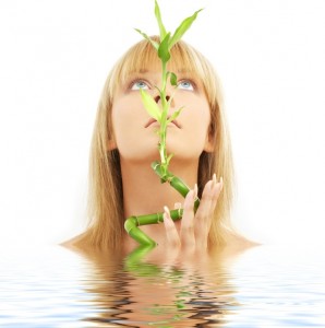 lovely blond with bamboo in water